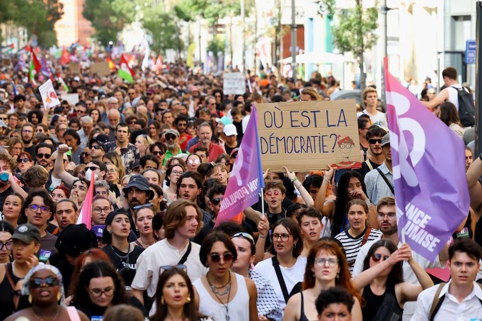 Thousands protest in France against Macron’s choice of prime minister