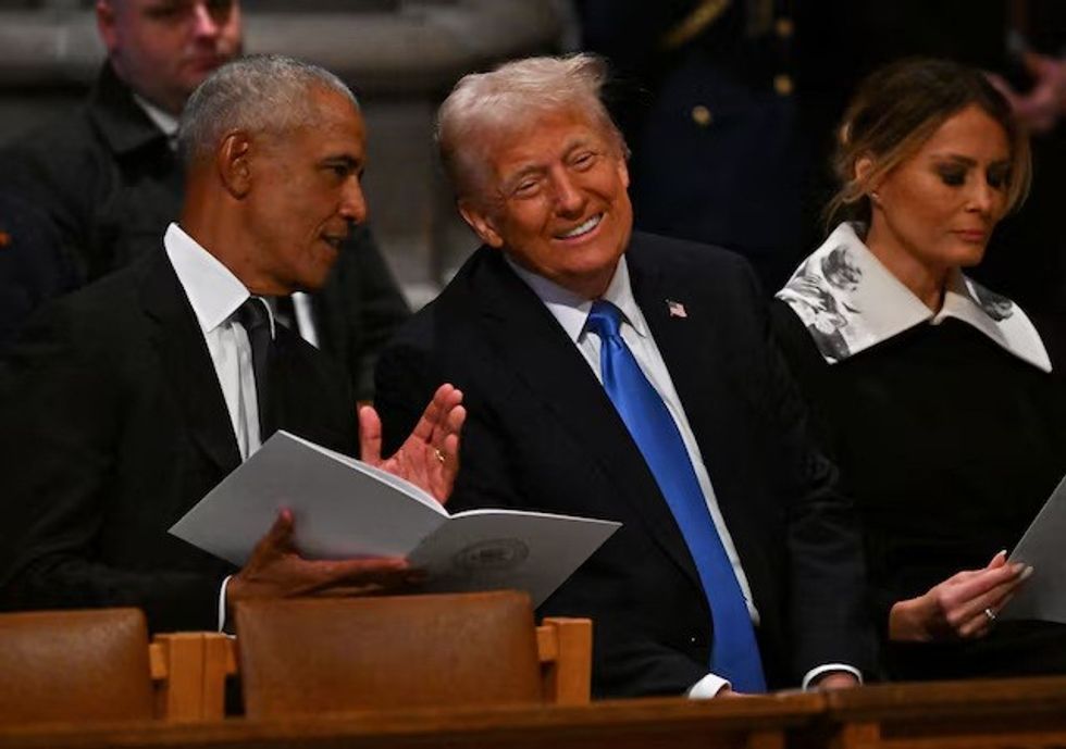 Trump posts, then deletes, racist clip of Obamas as monkeys